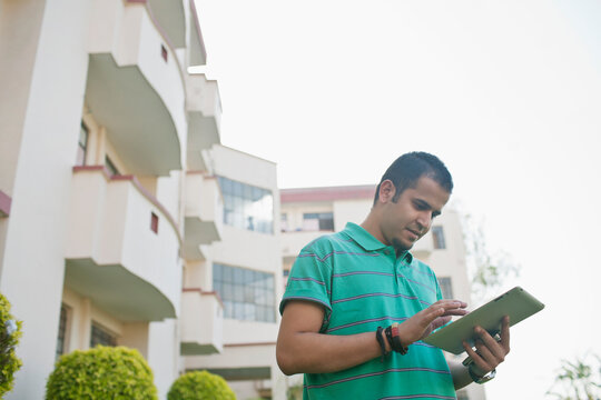 Teenager with digital tablet