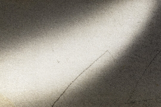 Textured vintage brown paper background with subtle gradient from light to dark shades, featuring a smooth, worn surface ideal for design projects.