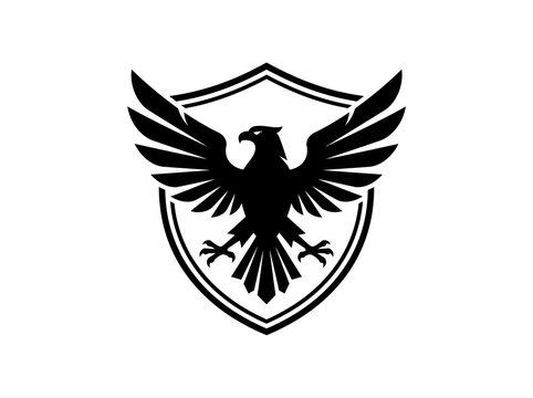 Black silhouette of a majestic falcon or eagle bird with spread wings inside a protective shield emblem vector design