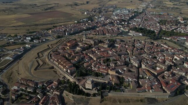 Drone footage highlighting Ciudad Rodrigo&rsquo;s preserved fortress walls and cultural heritage. Detailed drone shot of Ciudad Rodrigo rooftops, cathedral, and historic urban landscape.