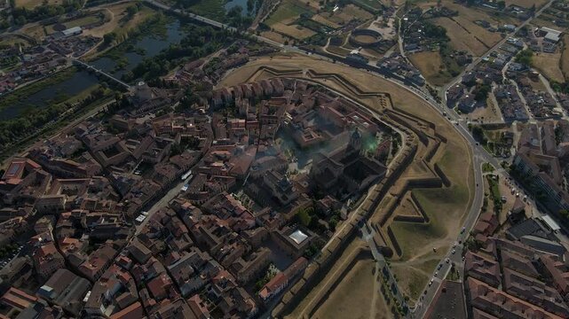 4K aerial footage of Ciudad Rodrigo featuring its cathedral, fortress walls, and charming historic center set against a natural Spanish landscape.