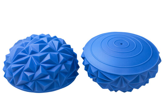 Pair of blue massage balance pods isolated on white background. Textured foot massage hemisphere for balance training and rehabilitation