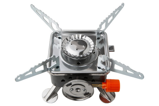 Compact portable camping gas stove with folding pot supports isolated on white background. Single burner tourist stove with piezo ignition studio shot