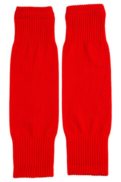 Pair of red footless football socks isolated on white background. Soccer calf sleeves for shin guard support top view studio shot