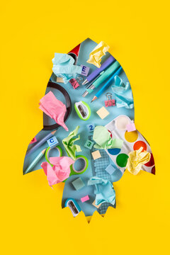 Back to school Background with Rocket with School Supplies