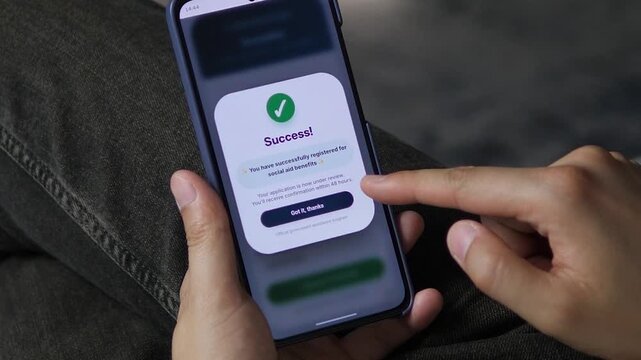 A mobile screen confirms successful registration for a government social aid program. The clean interface provides immediate feedback with a green checkmark and clear instructions