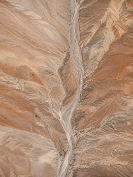 Desert Wash Cutting Through Layered Earth