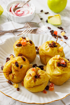 baked green apples with raisins, candied fruit