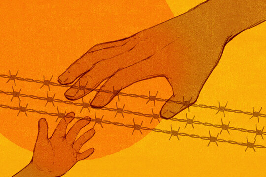 Man's hand reaching for child's hand across barbed wire