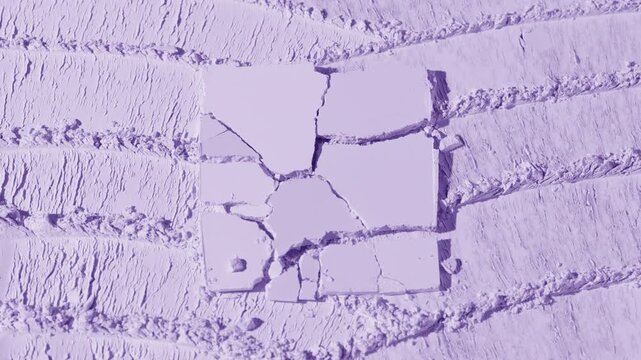 Vertical jib shot of a pastel violet powder surface featuring layered palette knife strokes highlighted by rotating light that casts shifting shadows