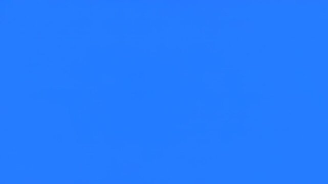 Abstract blue glowing particles flowing dynamically in dark space with subtle camera movement