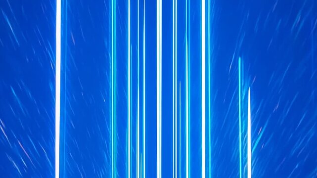 Abstract blue light streaks moving in rhythmic patterns during a dark cinematic sequence