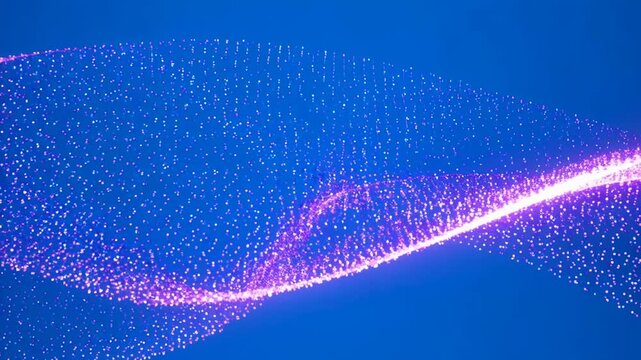 Abstract glowing particles forming smooth wave patterns during digital animation against a deep blue background