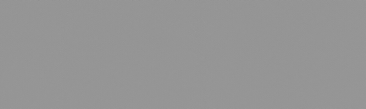 Gray finely textured cement plaster surface wide large background. Grey rough wall texture widescreen wallpaper. Abstract panoramic long backdrop