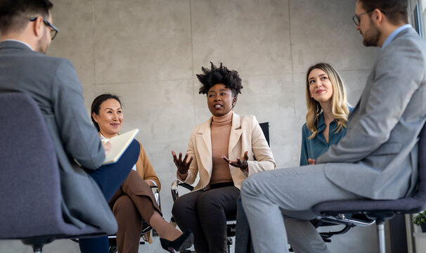 Counseling, psychology discussion with diverse people in therapy for depression, stress and anxiety