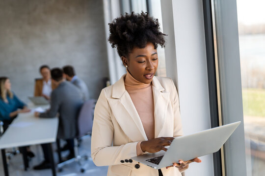 A lawyer reviews contracts and legal briefs, providing professional counsel, litigation strategy