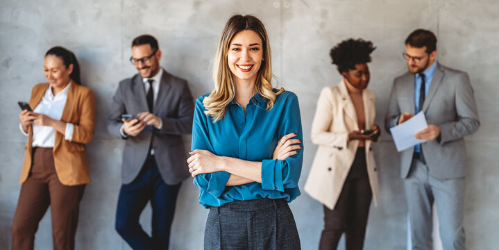 Successful executive standing proudly in office, representing business growth, partnership