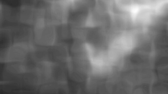 Abstract grey smoke motion background with blurry fog texture for cinematic atmospheric overlay video clip.