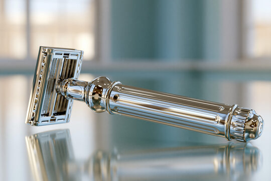 Razor with shiny handle on reflective surface