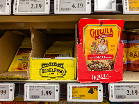Quebec, Canada, 13 May 2026 : Cholula and Old El Paso taco seasoning mixes are displayed on a supermarket shelf.