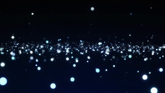 Soft star field points drifting through deep black space
