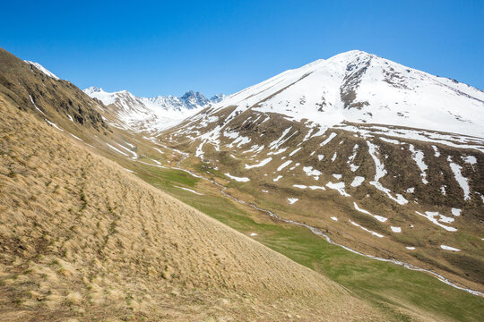 Trekking in Caucasus Mountains landscape. Karachay-Cherkessia, Russia