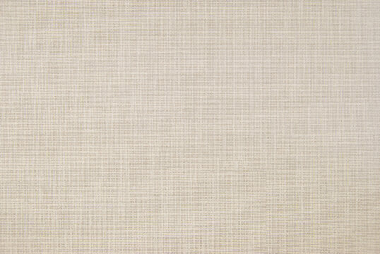 Beige fine woven canvas texture as background	