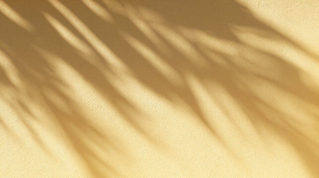 Palm Leaf Shadow on Warm Beige Textured Wall Background