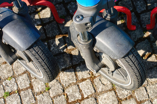Scooter on cobblestone street