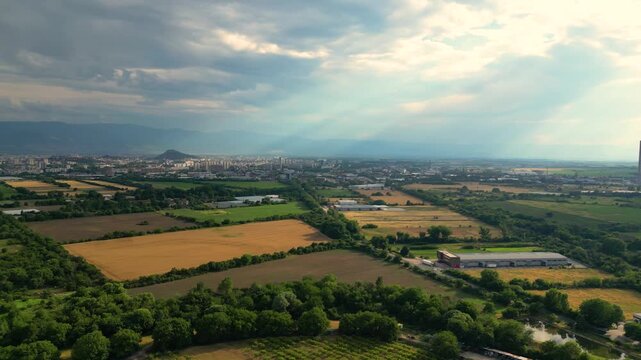 Aerial Panorama of Plovdiv, Bulgaria with Farmland, City Skyline and Rhodope Mountains