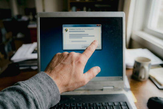 Administrator access request window on laptop screen