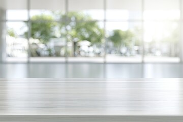 Fototapeta premium Bright, empty modern space with a glossy wooden desk and blurred outdoor view
