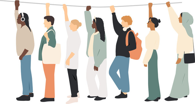 Different people standing in a line holding a handrail.