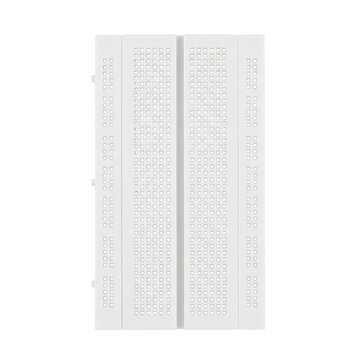 White plastic breadboard for electronics prototyping and circuit building