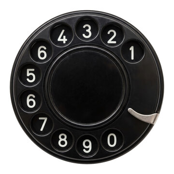 Vintage black rotary telephone dial with numbers zero through nine on a white background
