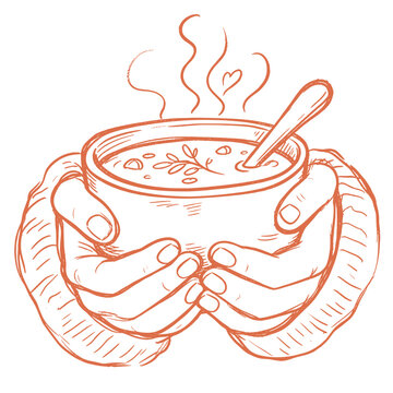 Hands holding a warm bowl of soup