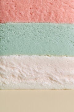 Pastel Layered Cake Texture in Pink, Mint Green and Cream &ndash; Minimal Dessert Close-Up