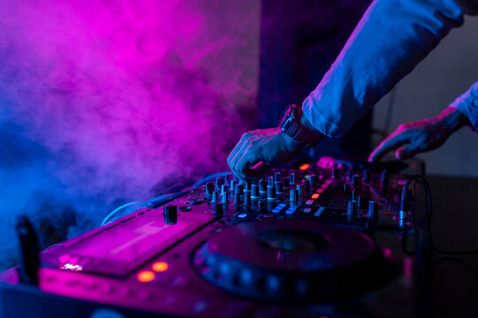 DJ mixing vibrant nightclub beats