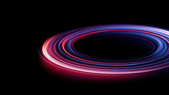 Abstract light trails forming rings in neon red and blue on black background