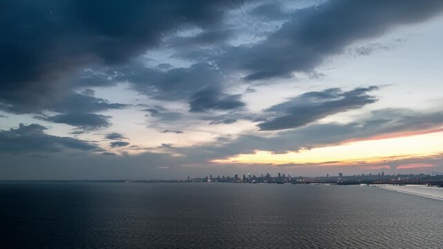 Sunset at Chaohu Lake Hefei Binhu: City Silhouette and Lakeside Reeds at Dusk