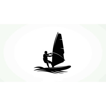 Silhouette of a windsurfer riding waves on the ocean