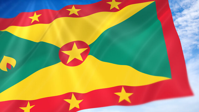Grenada Waving Flag on Blue Sky Background