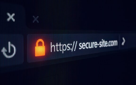 Closeup of a web browser address bar with a glowing orange padlock icon