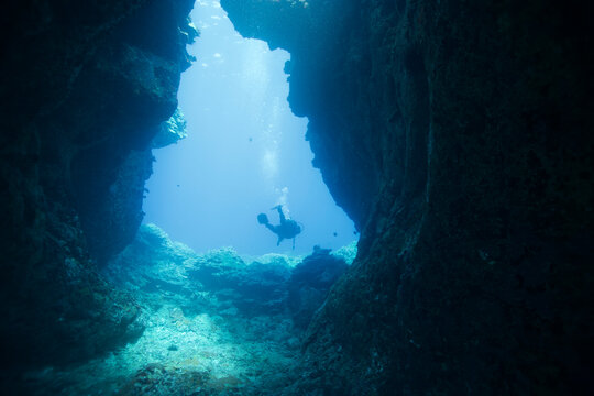 Diver exiting an enclosure near Hawaii