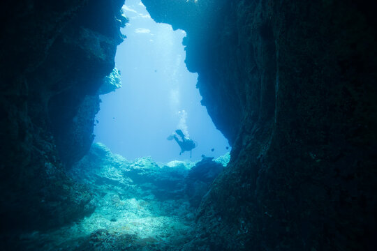 Diver exiting an enclosure near Hawaii