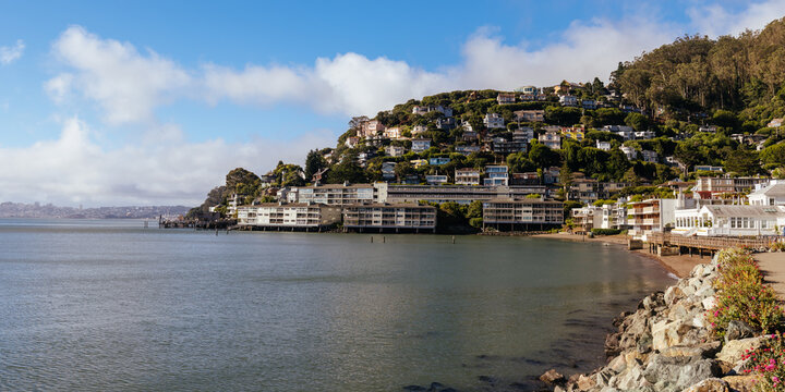 Hillside residential area in Sausalito overlooking San Francisco Bay on partly cloudy day