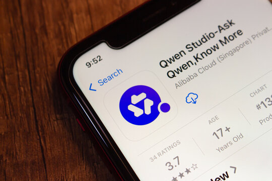 Mexico City, MEXICO - Jul 21 2026 : Close-up of an iPhone showing the App Store page for Qwen Studio by Alibaba Cloud Singapore Private Limited, with the app icon.