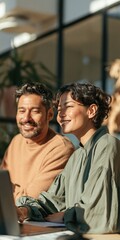 Obraz premium Smiling diverse coworkers in a sunlit office meeting background for team website banner and corporate teamwork portrait