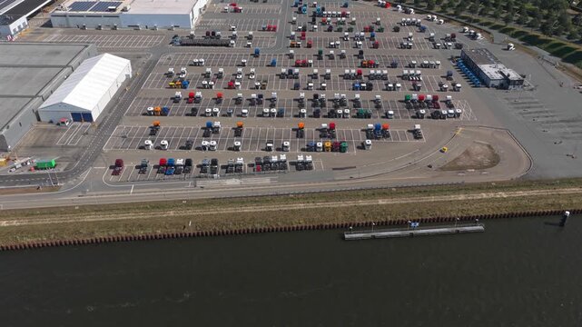 Aerial view of a large truck factory parking lot
