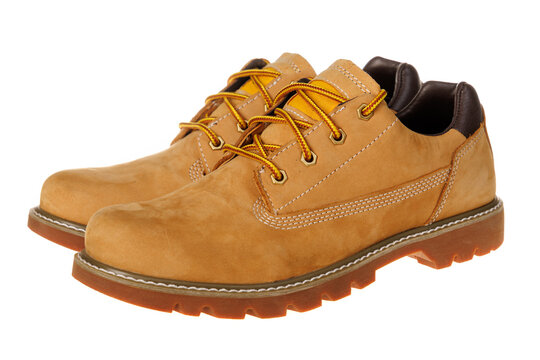 Pair of Yellow Leather Boots Isolated on White. Durable Outdoor Fashion Footwear for Hiking and Construction